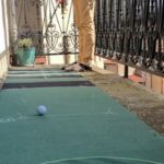 entrainement golf sur le balcon